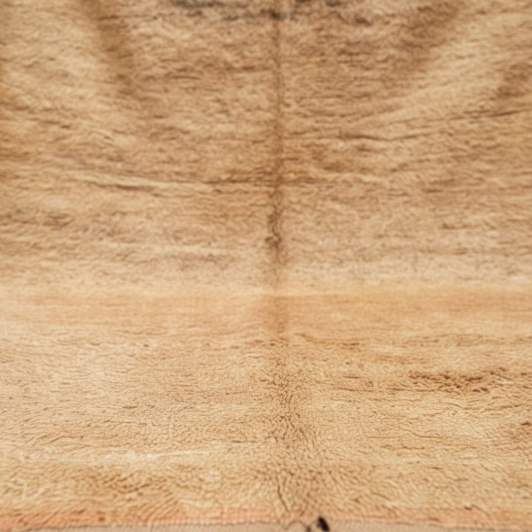 Close-up of the warm earthy wool texture of the Moroccan Rug.