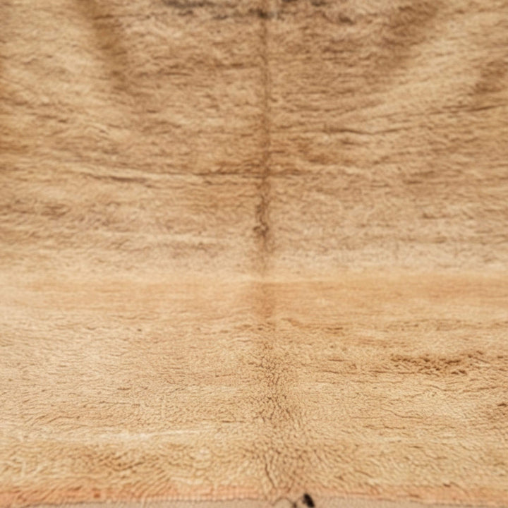Close-up of the warm earthy wool texture of the Moroccan Rug.