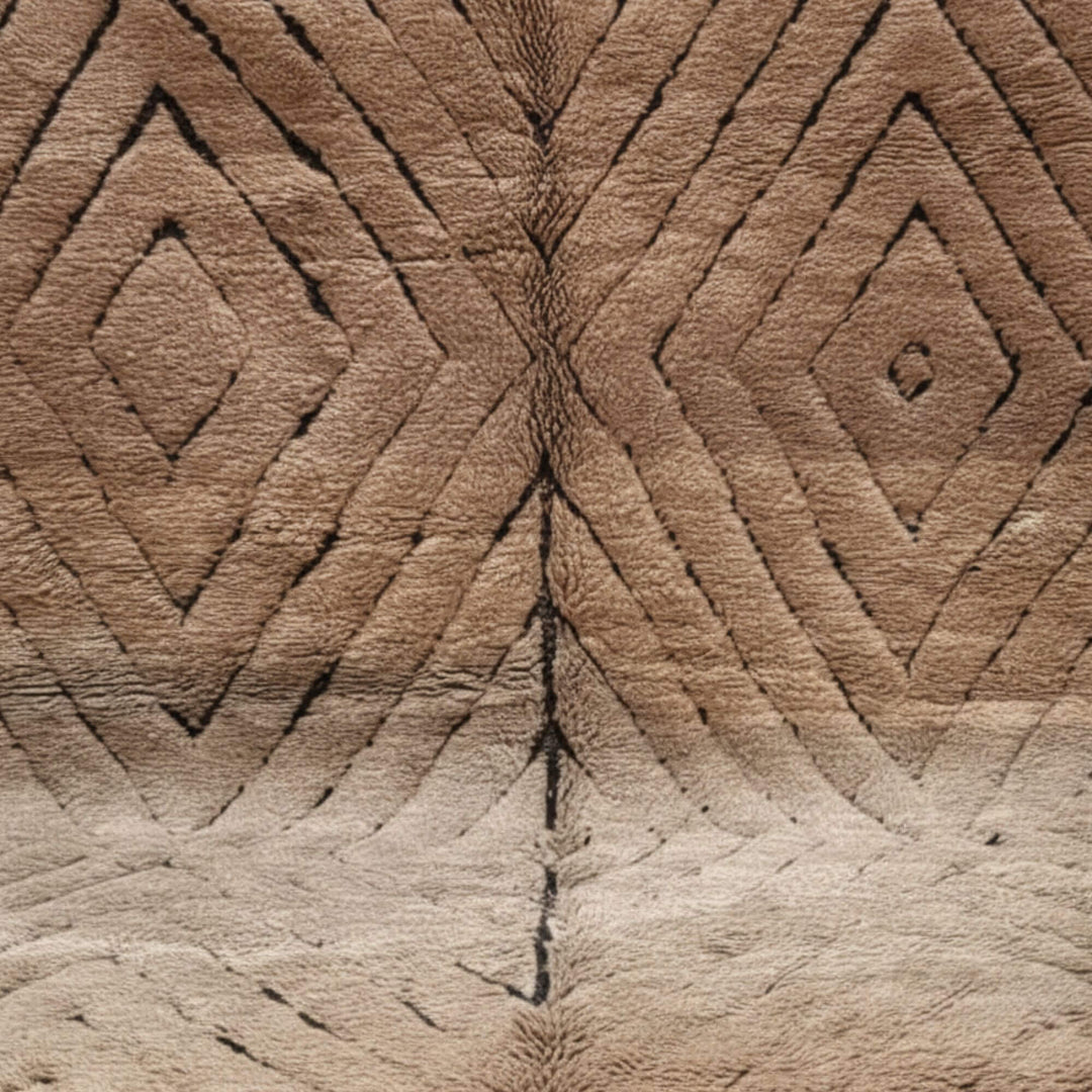 Close-up of the wool texture and geometric diamond lines of the Moroccan Rug.