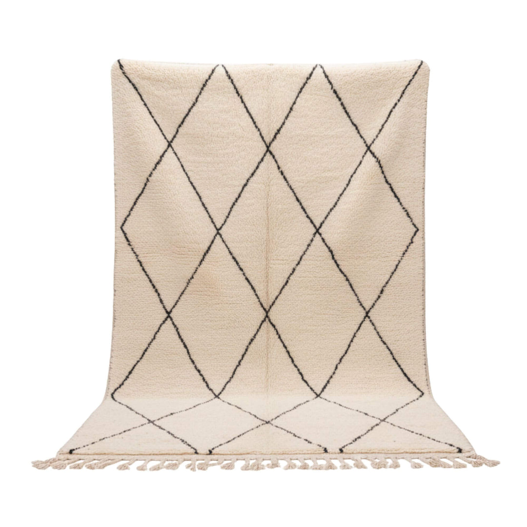 Front view of the Moroccan rug in natural wool with black diamond pattern.
