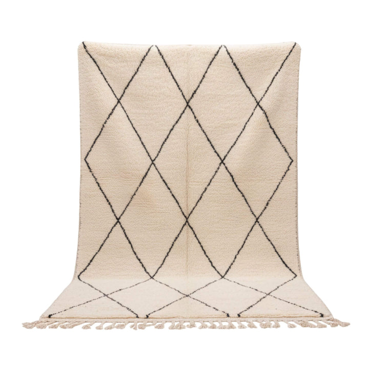 Front view of the Moroccan rug in natural wool with black diamond pattern.