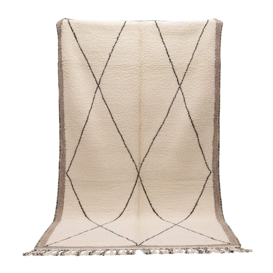 Front view of the Moroccan Rug with curved diamond pattern on a cream wool base.