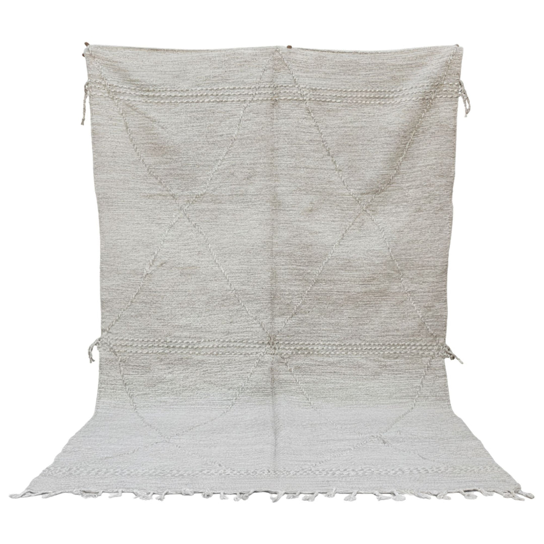 Front view of the large Moroccan rug with subtle cream-toned linear design.