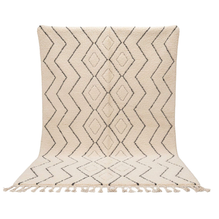 Front view of the Moroccan Rug with geometric charcoal pattern on a cream wool base.