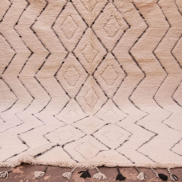 Close-up of the geometric wool pattern and texture of the Moroccan Rug.