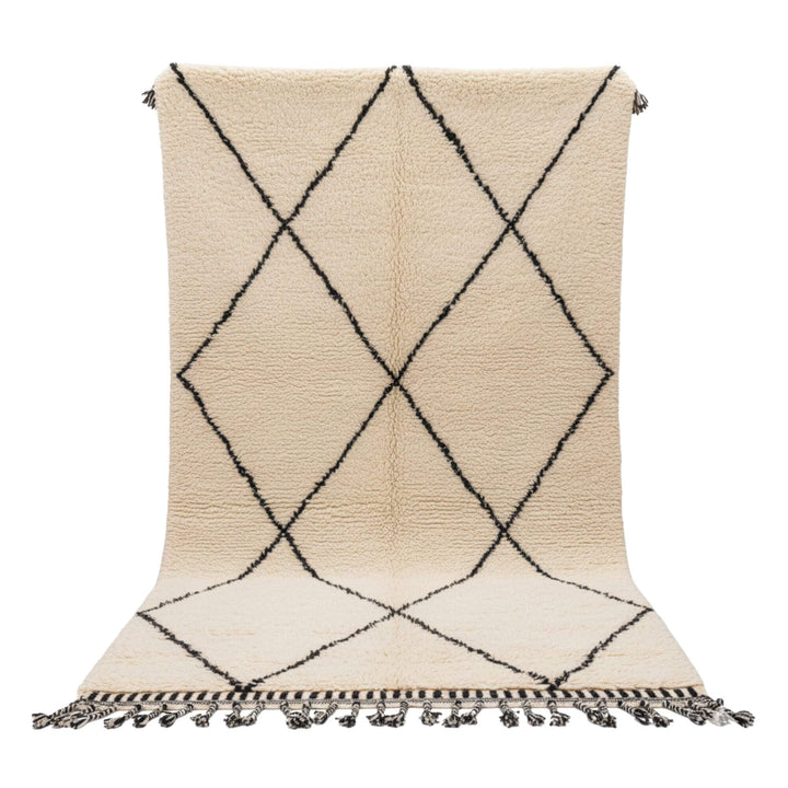 Full view of the Moroccan Rug in natural wool with geometric dark lines.