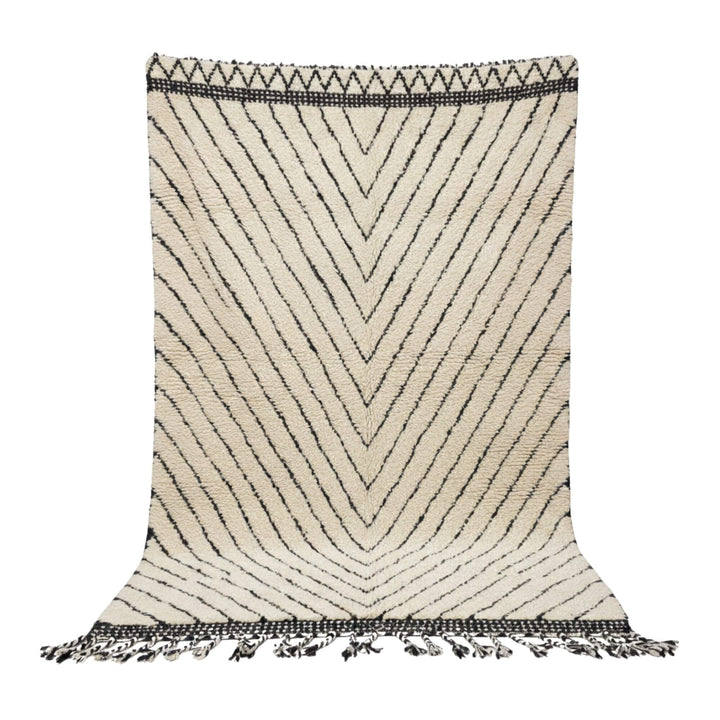 Front view of the Moroccan Rug with cream base and dark V-shaped lines.