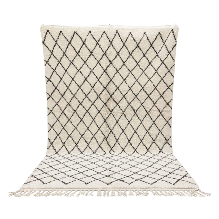 Front view of the Moroccan Rug in cream wool with black diamond pattern.