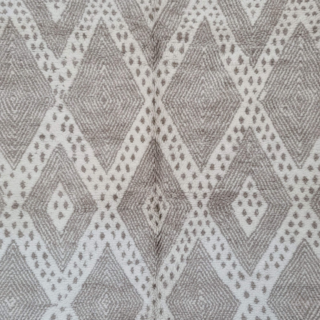 Close-up of the diamond-patterned wool texture of the Moroccan Rug.