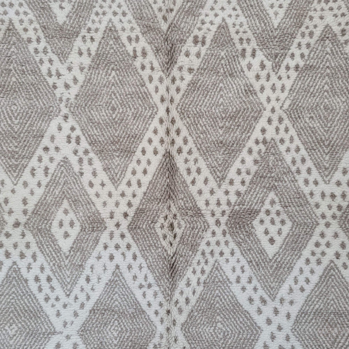 Close-up of the diamond-patterned wool texture of the Moroccan Rug.