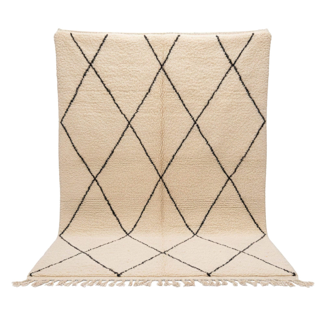 Front view of the Moroccan Rug in cream wool with black diamond pattern.