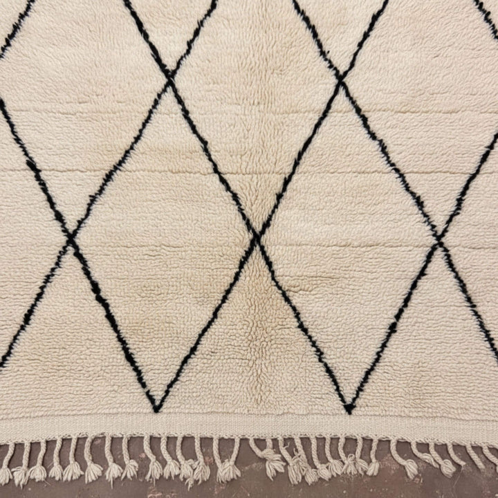 Close-up of the wool texture and diamond design of the Moroccan Rug.