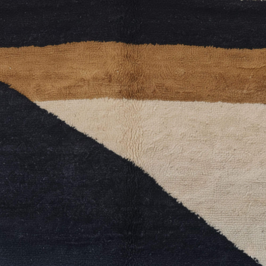 Close-up of the geometric pattern and color transitions of the Moroccan Rug.