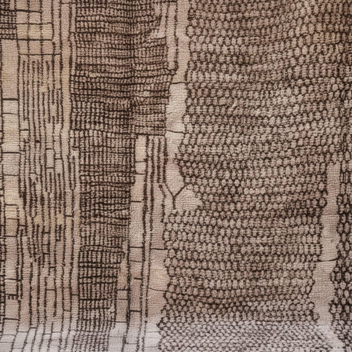 Close-up of the detailed handwoven geometric pattern on the Moroccan Rug.