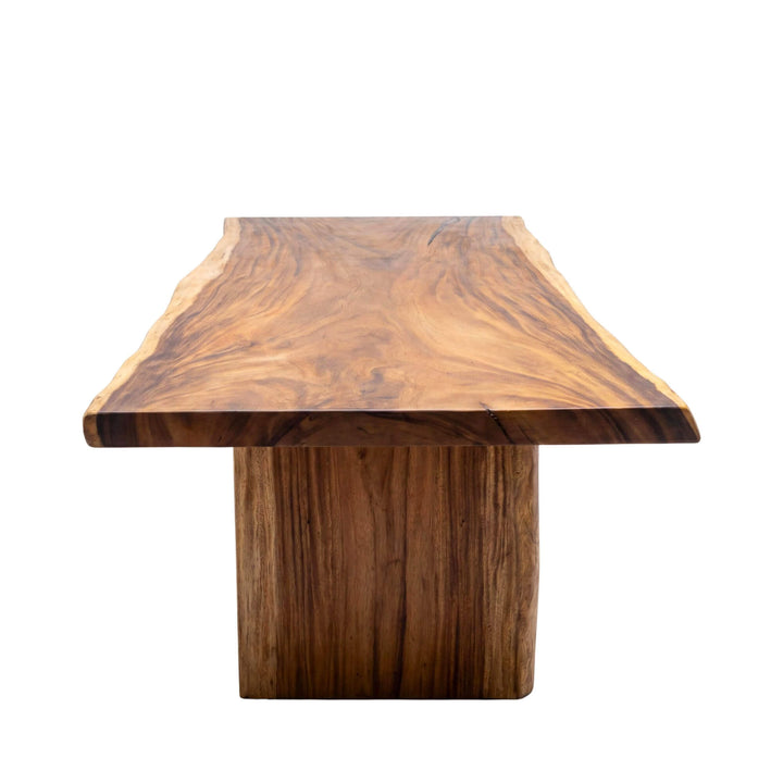 Front view of the Motu Nui dining table showing its thick tabletop and central solid wood base.