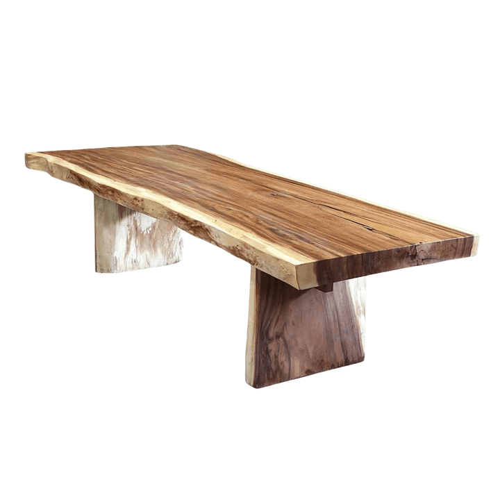 Wooden dining table with a natural finish on a white background