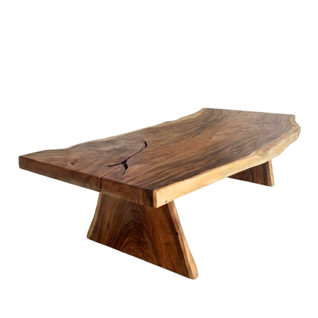 Motu Nui suar wood dining table with a unique curved shaped base on a white background