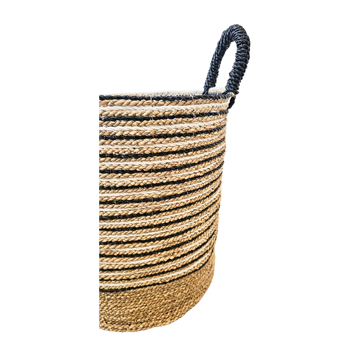 Side angle of Mughsayl Seagrass Basket highlighting texture and stripes.