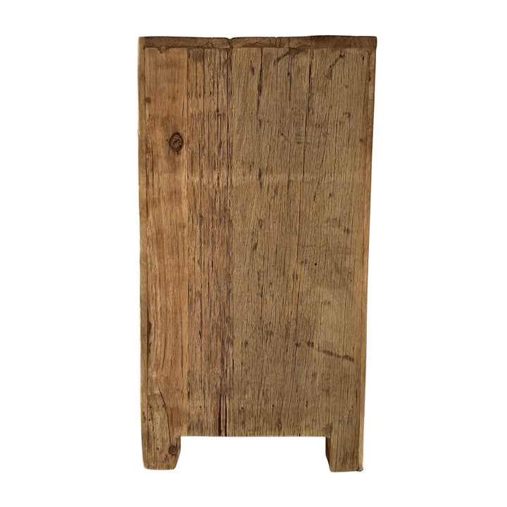 “Wooden nightstand with storage, crafted from reclaimed materials.”
