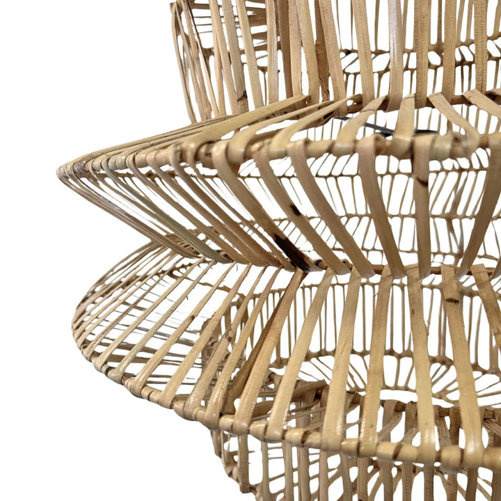 Close-up highlighting layered rattan weave of Muri ceiling lamp