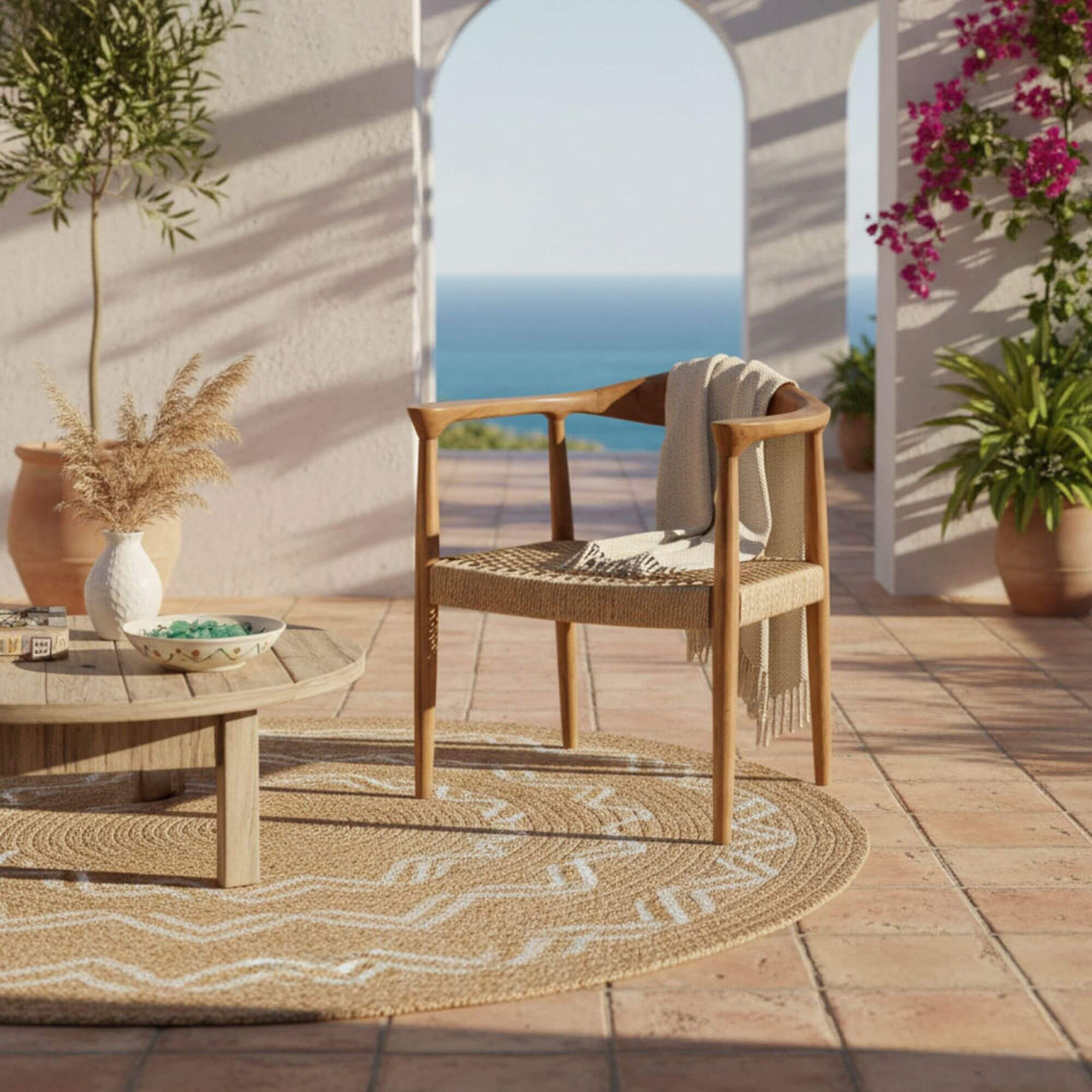 Outdoor setting of Mur Dining Chair on a terrace with boho chic style