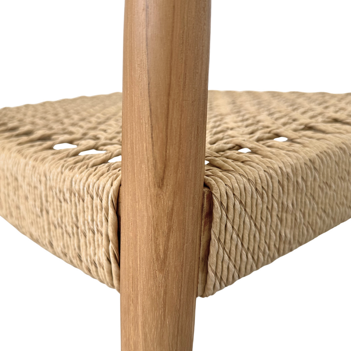 Close-up of teak leg and seat joint on Mur Dining Chair.