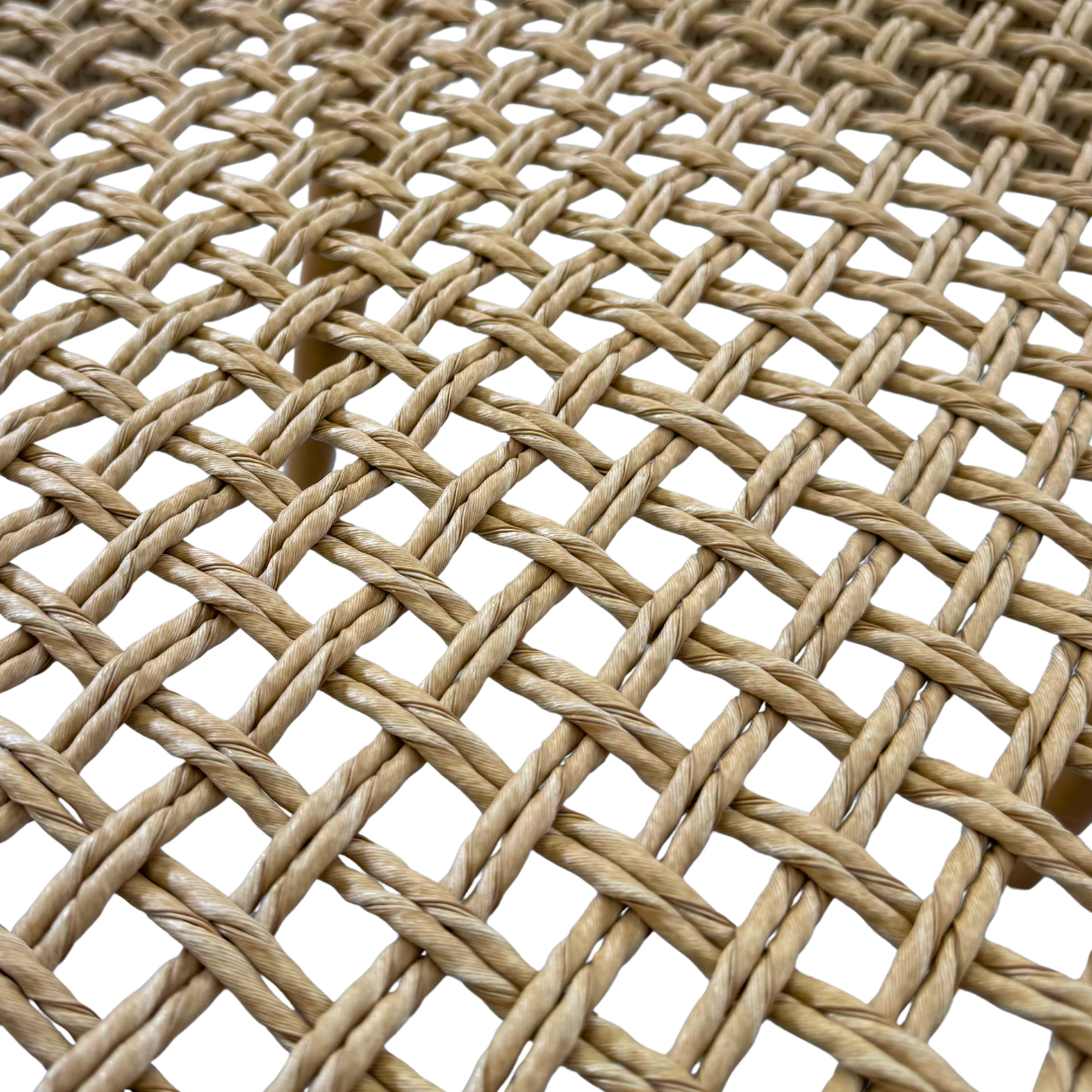 Close-up of smooth natural teak finish on Mur Dining Chair.