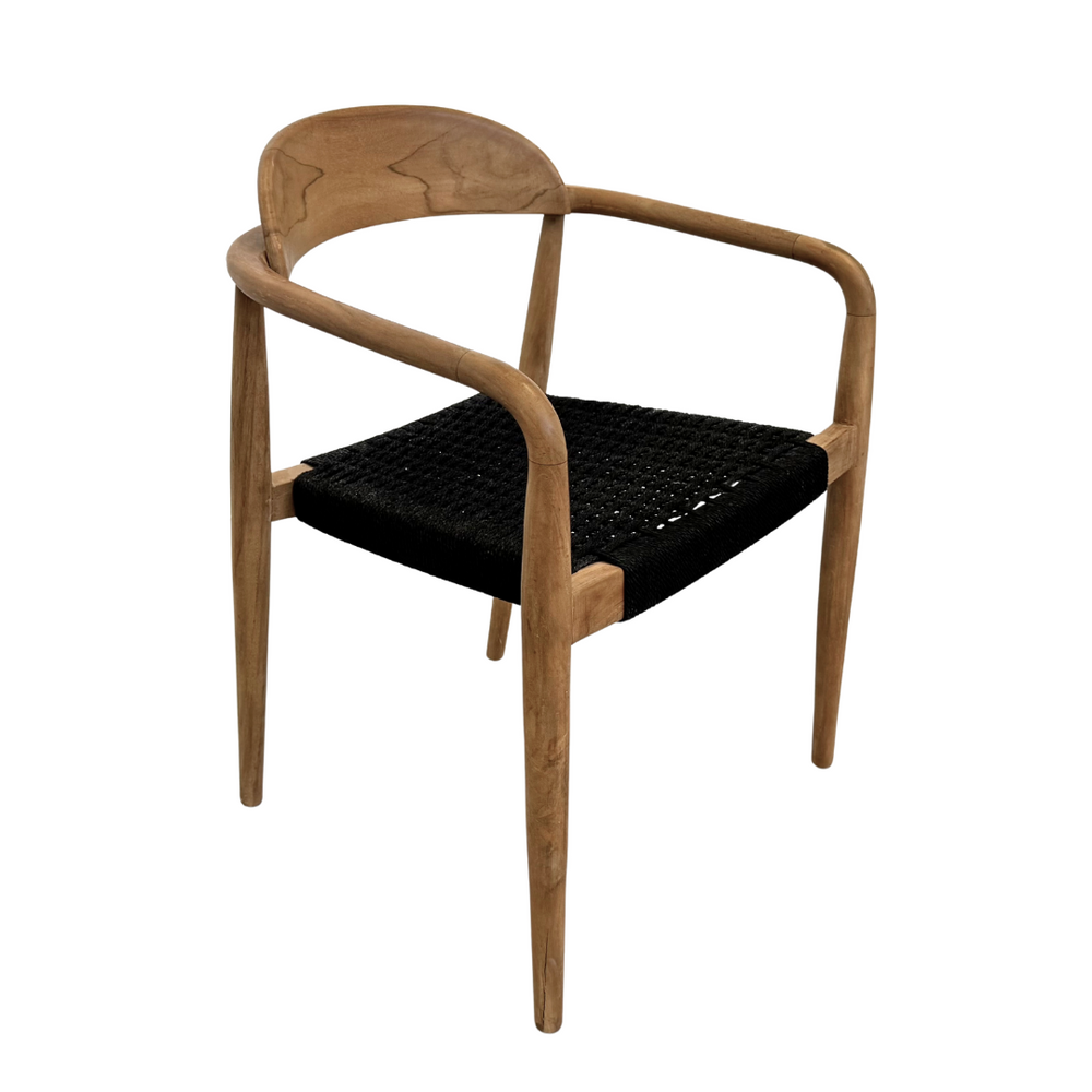 Three-quarter angle of Mur chair showing curved arms and low backrest
