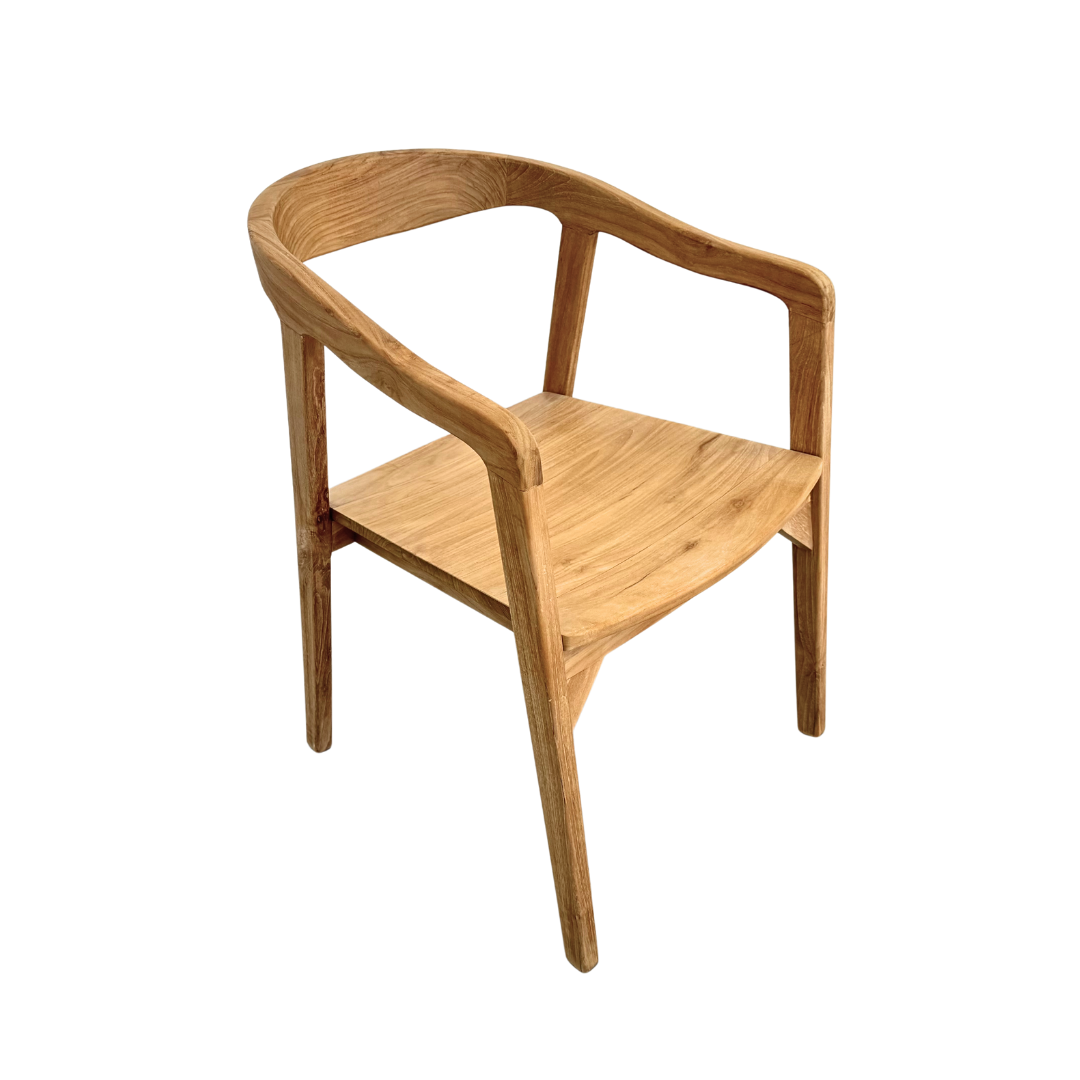 Side angle of the Mur Teak Dining Chair showing the curved backrest.