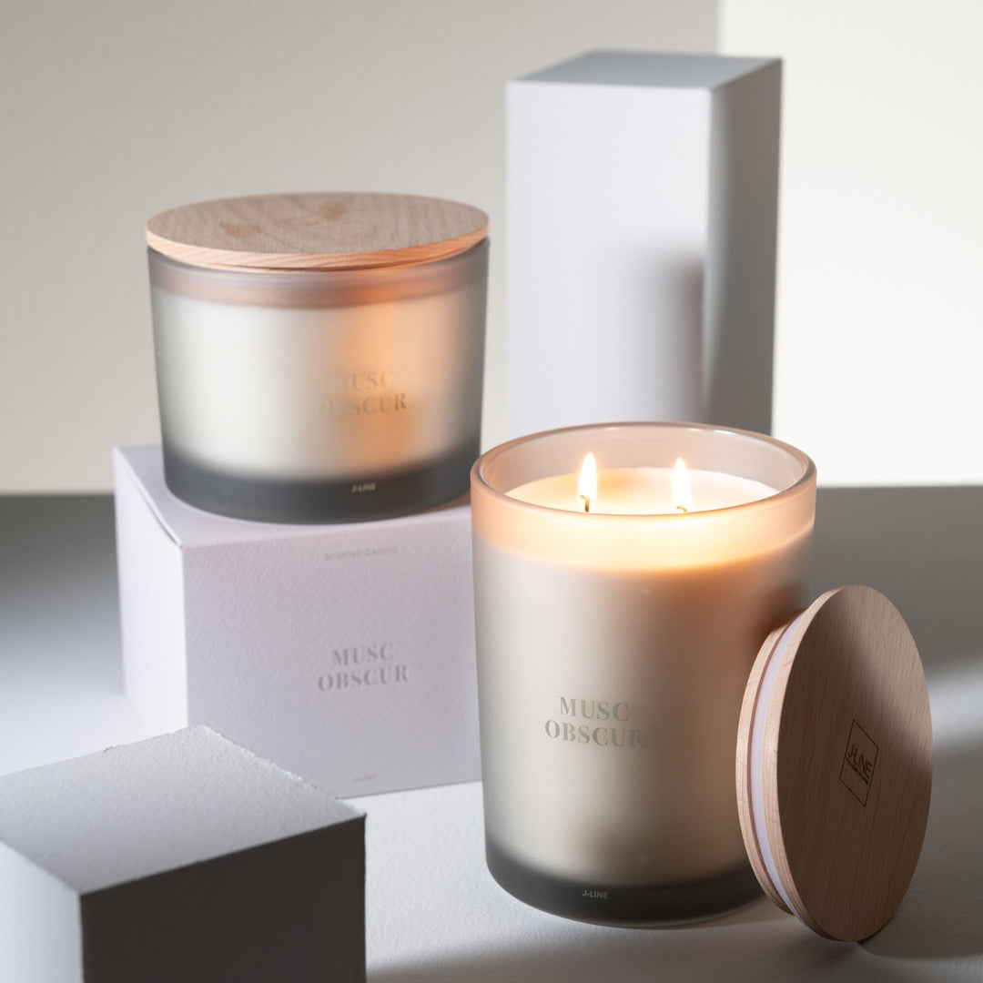 Lifestyle image featuring multiple Musc Obscur products styled together.