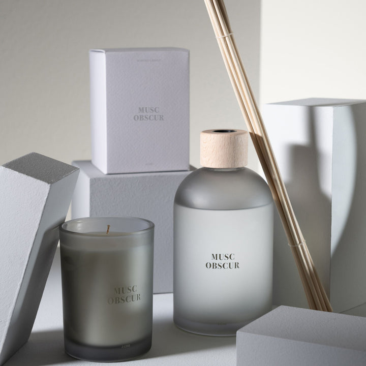 Stylish arrangement of the Musc diffuser next to complementary home fragrance products.