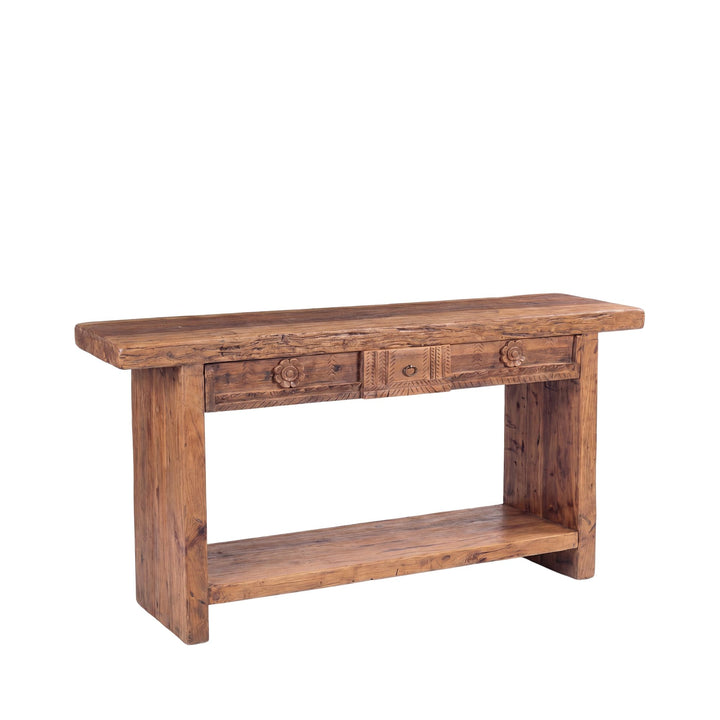 Front three-quarter view of the console highlighting its handcrafted details and proportions.