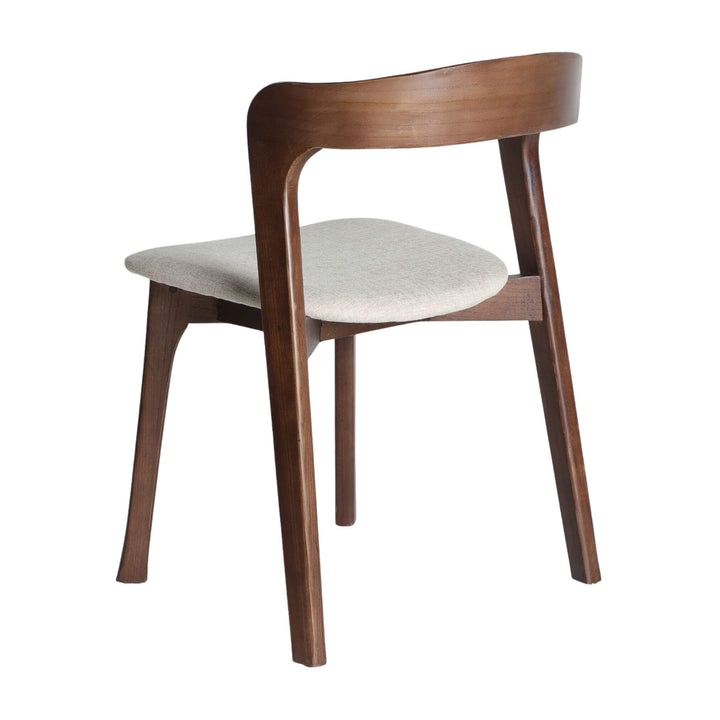 Rear three-quarter view of Nara Dining Chair with tapered legs.