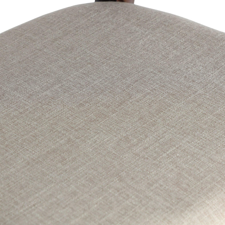 Macro texture of natural beige linen upholstery.