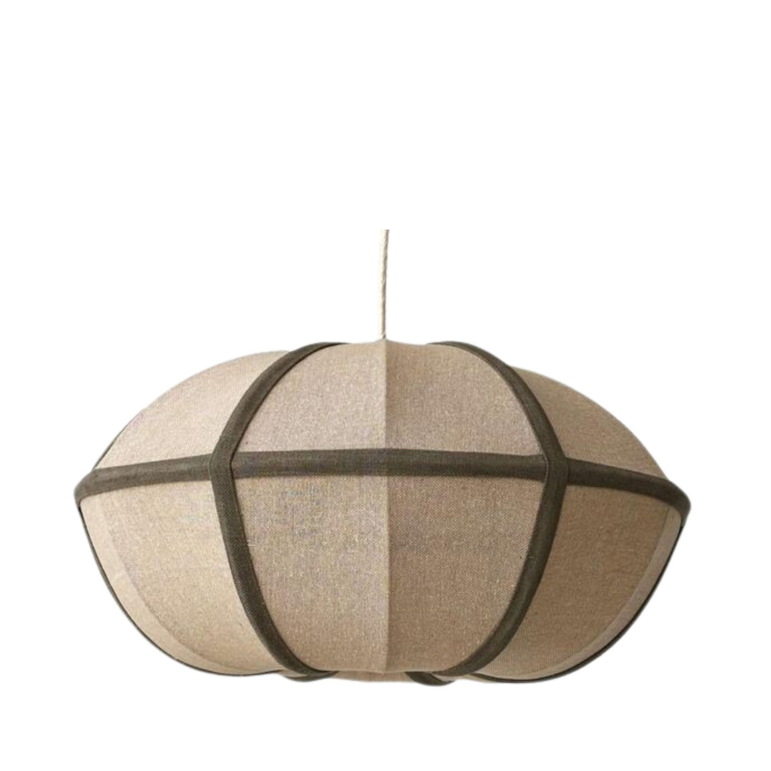 Angled view of the pendant lamp highlighting its sculptural form and natural linen texture.