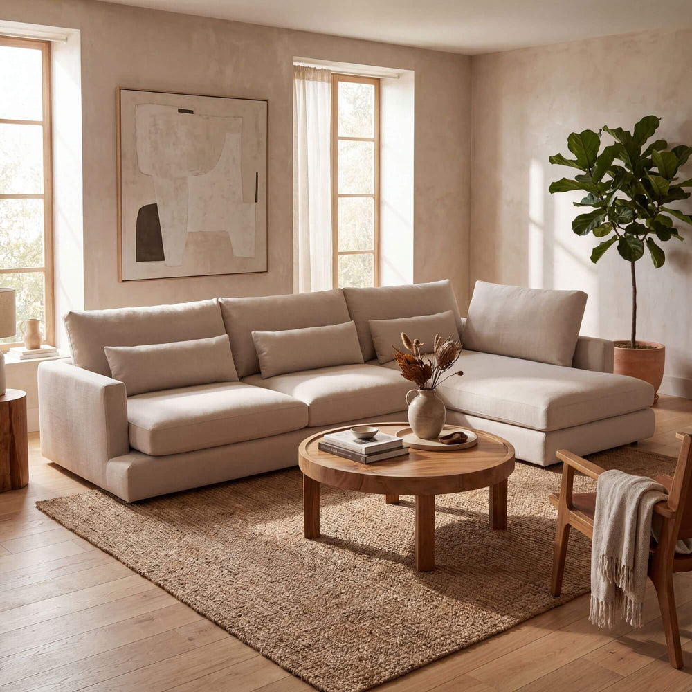 Styled living room setting featuring the Naxos sofa in a warm contemporary interior with natural tones.