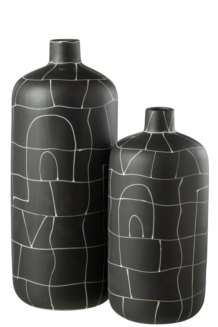 Set of Neo Collection ceramic vases displayed together in different sizes.
