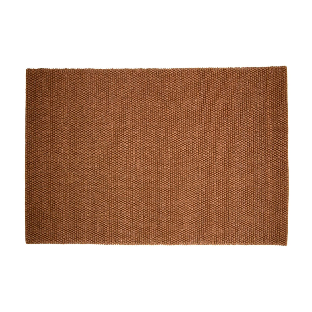 Front view of the New Loop Rug in warm earthy tone with looped texture.