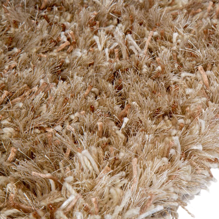 Close-up of the plush polyester fibers showing thick shag detail.