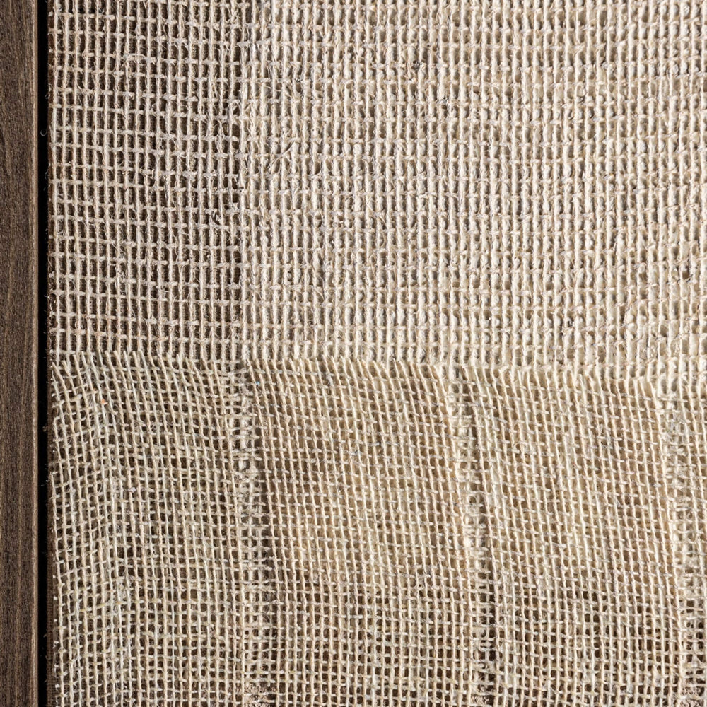Close-up of Nias Canvas wall art showing layered fabric texture in beige and white
