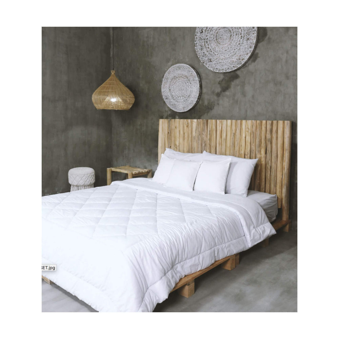 Nikko Headboard made of natural teak wood branches in a minimalist bedroom setting.