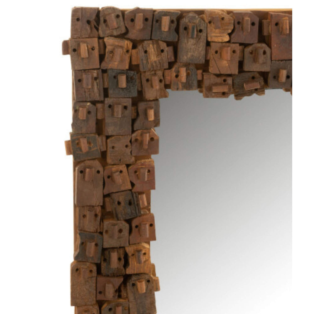 Close-up of Nommo Mirror showing handcrafted wooden texture.
