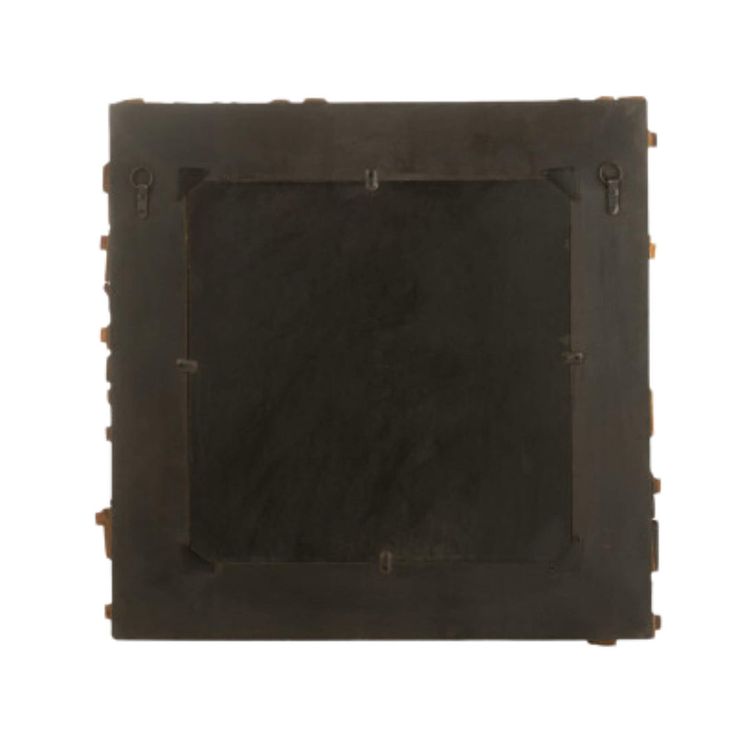 Close-up of Nommo Mirror showing handcrafted wooden texture.