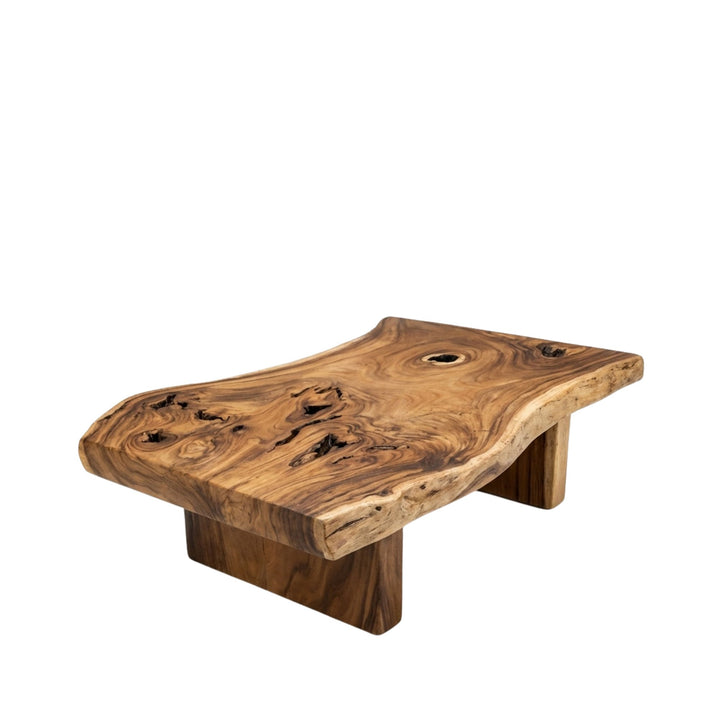 Front view of Noonu Coffee Table made from solid suar wood with an organic live-edge silhouette.
