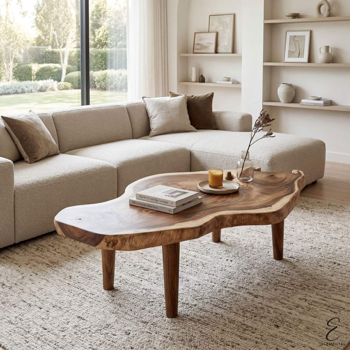 Styled living room setting featuring the Nuku Hiva coffee table as a sculptural centerpiece.