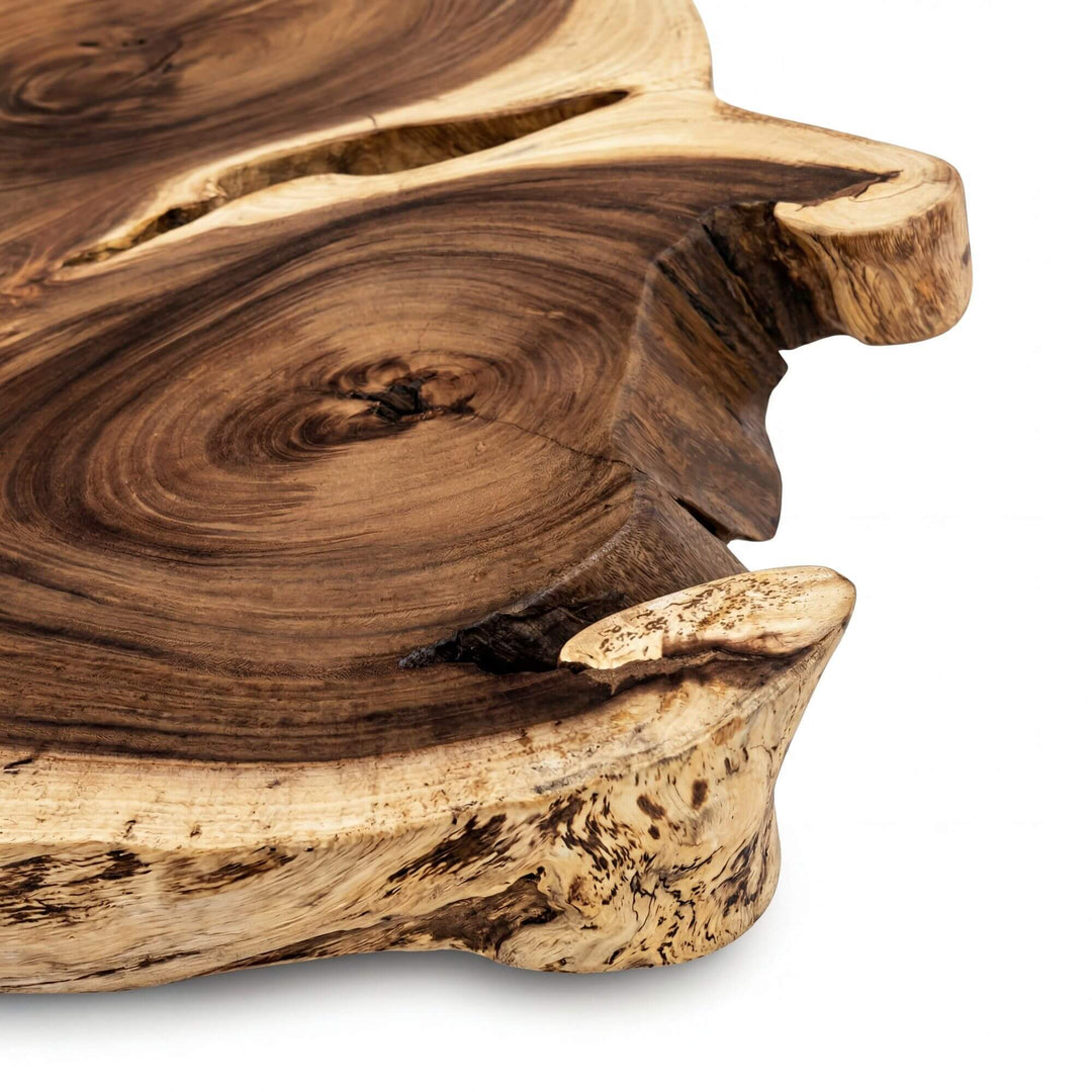Close-up detail of the live edge and swirling suar wood grain.