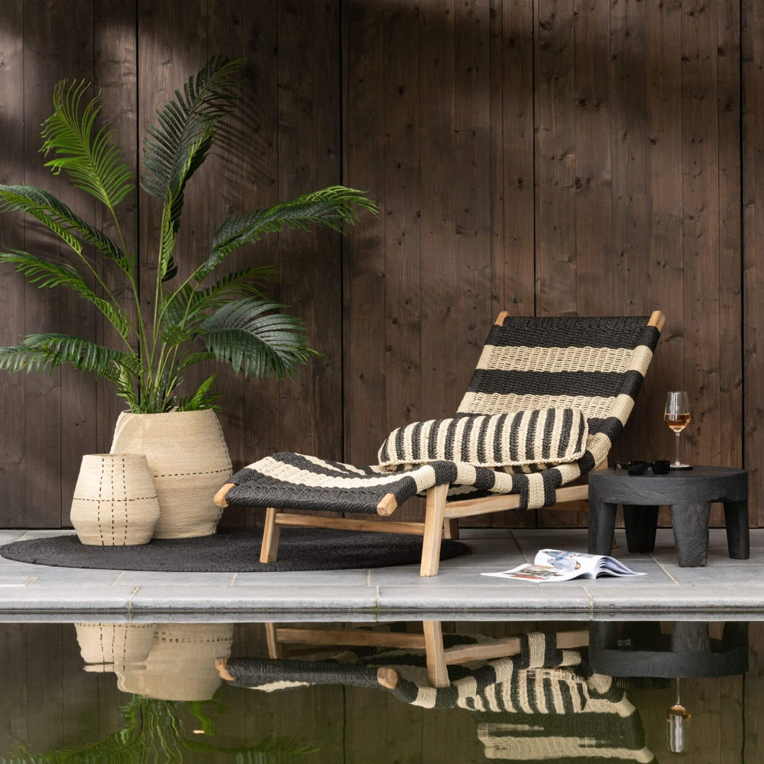 Lifestyle scene featuring Nungwi sunbed styled in a cozy corner