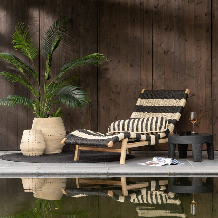 Lifestyle scene featuring Nungwi sunbed styled in a cozy corner