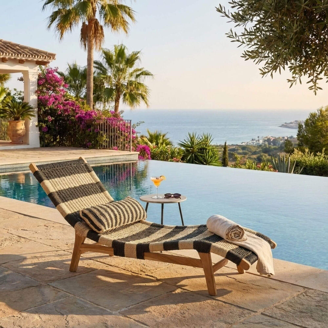 Styled poolside scene featuring the Nungwi sunbed in a relaxed outdoor setting.