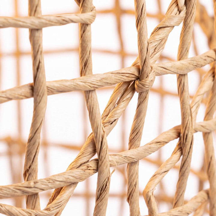 Close-up of the Nusa floor lamp highlighting the handwoven banana leaf fiber texture
